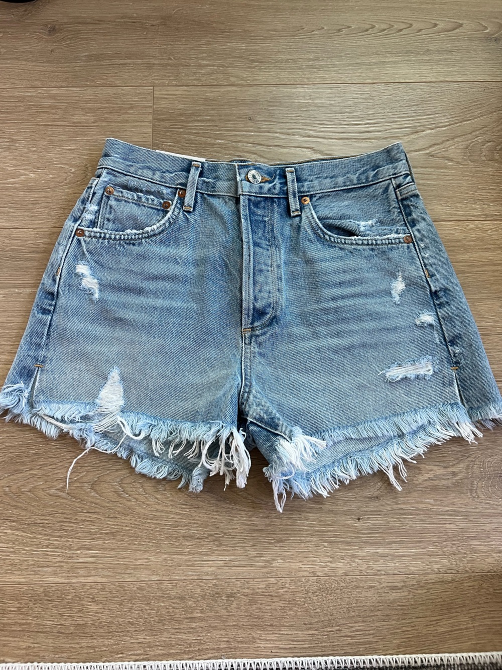 (NWT) Agolde Light Blue Distressed Fringe Hem Denim Shorts
